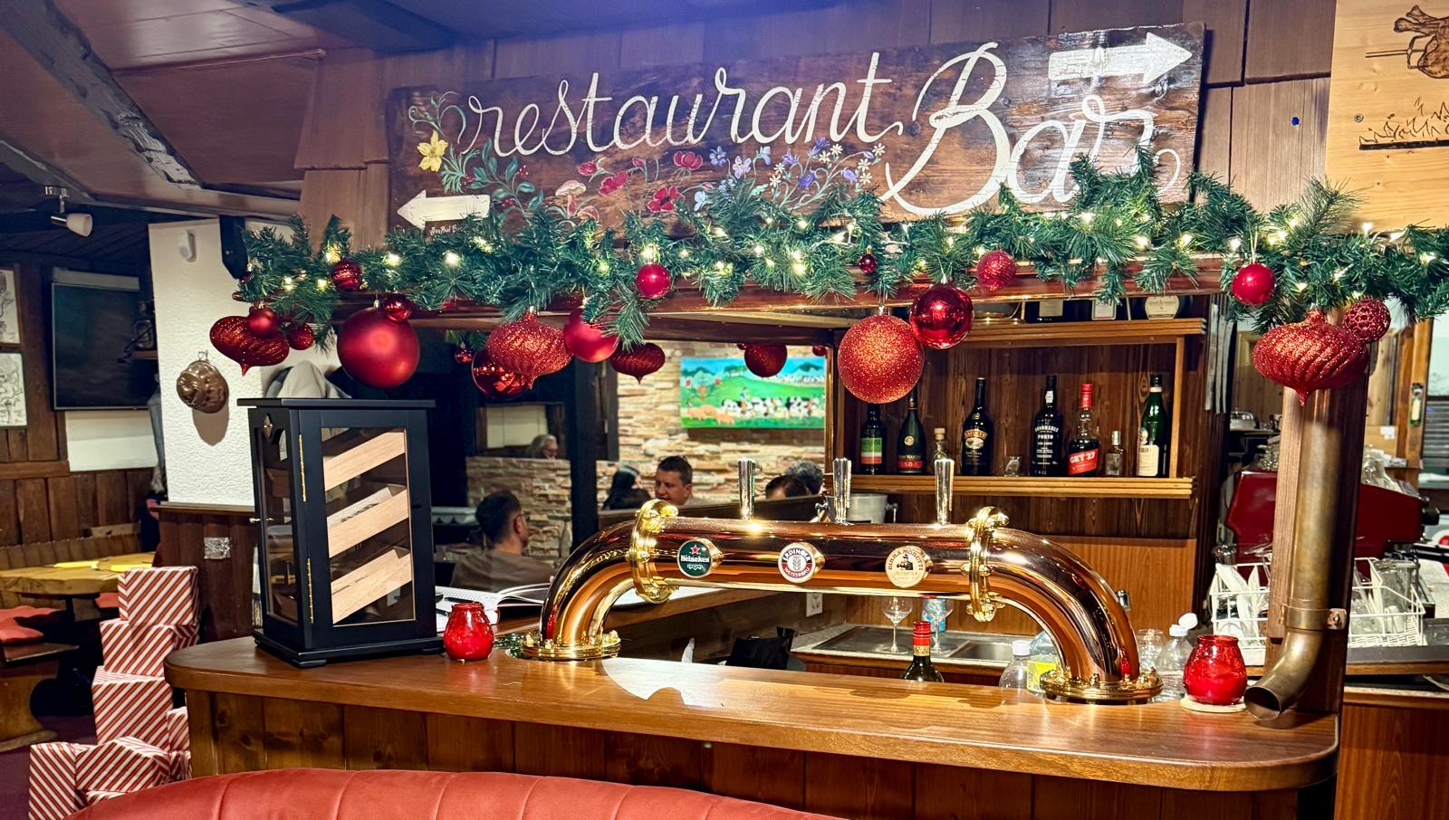 Restaurant decorated with garlands and festive atmosphere